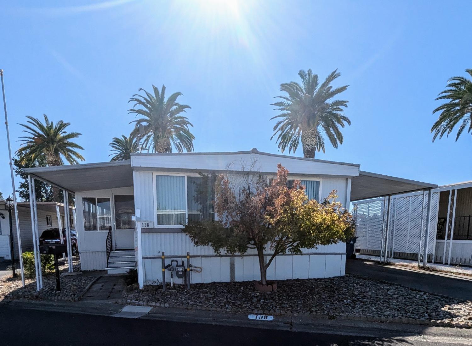 a view of a house with a patio