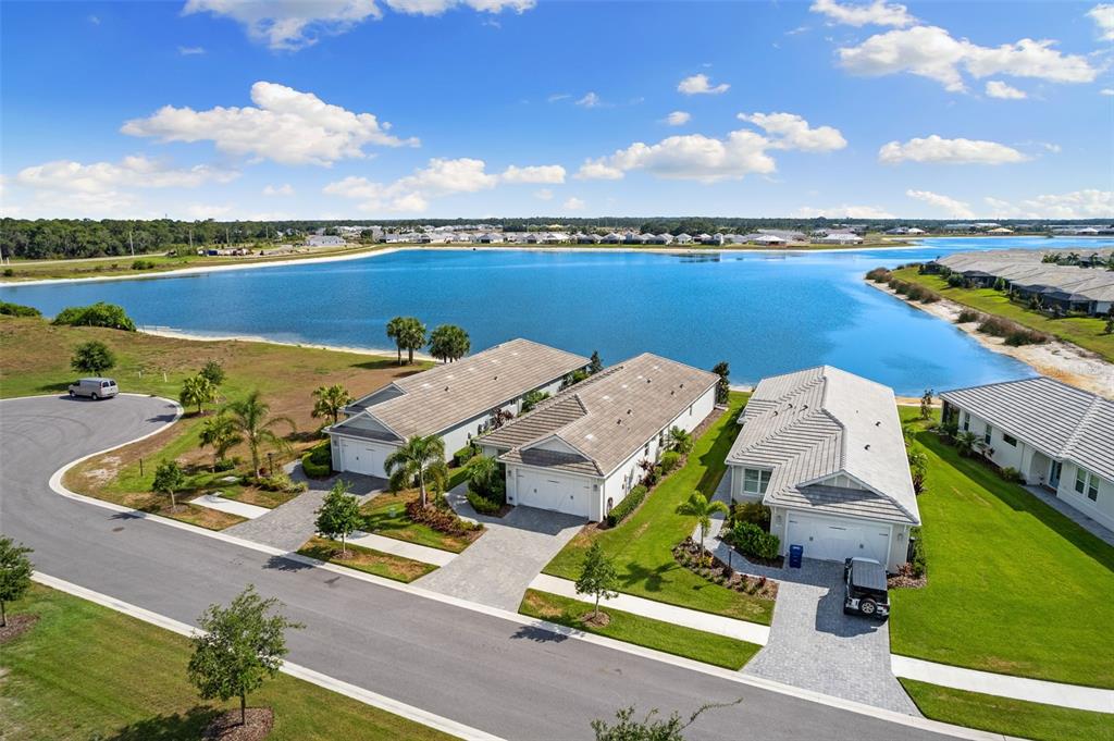 an aerial view of a house with a ocean view