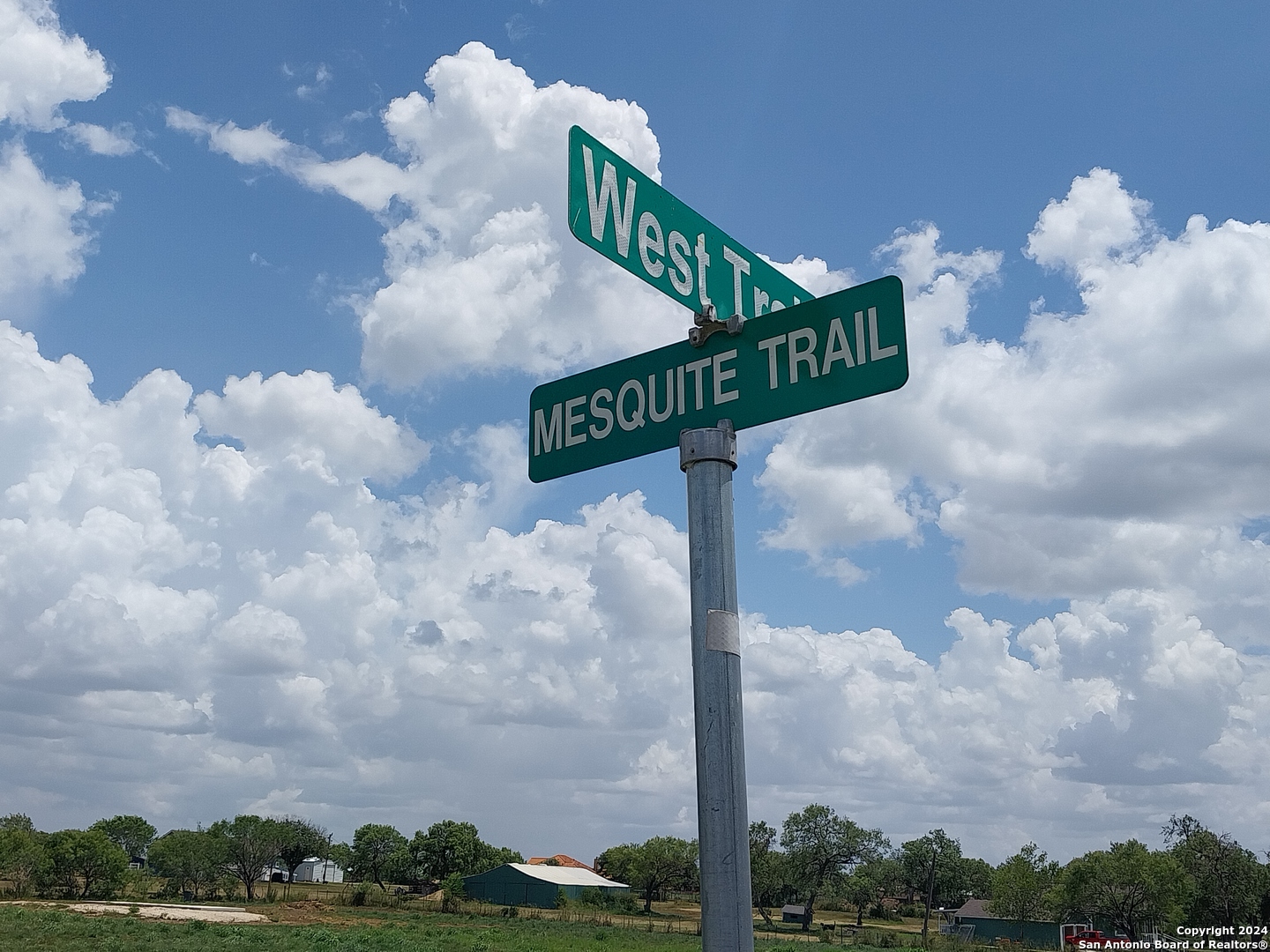 a view of a street with sign broad