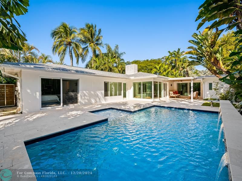 a front view of a house with swimming pool