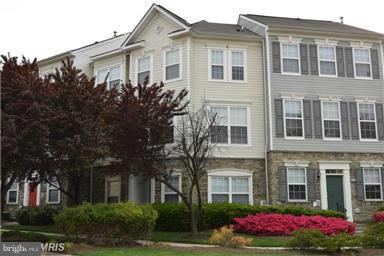 a front view of a multi story residential apartment building