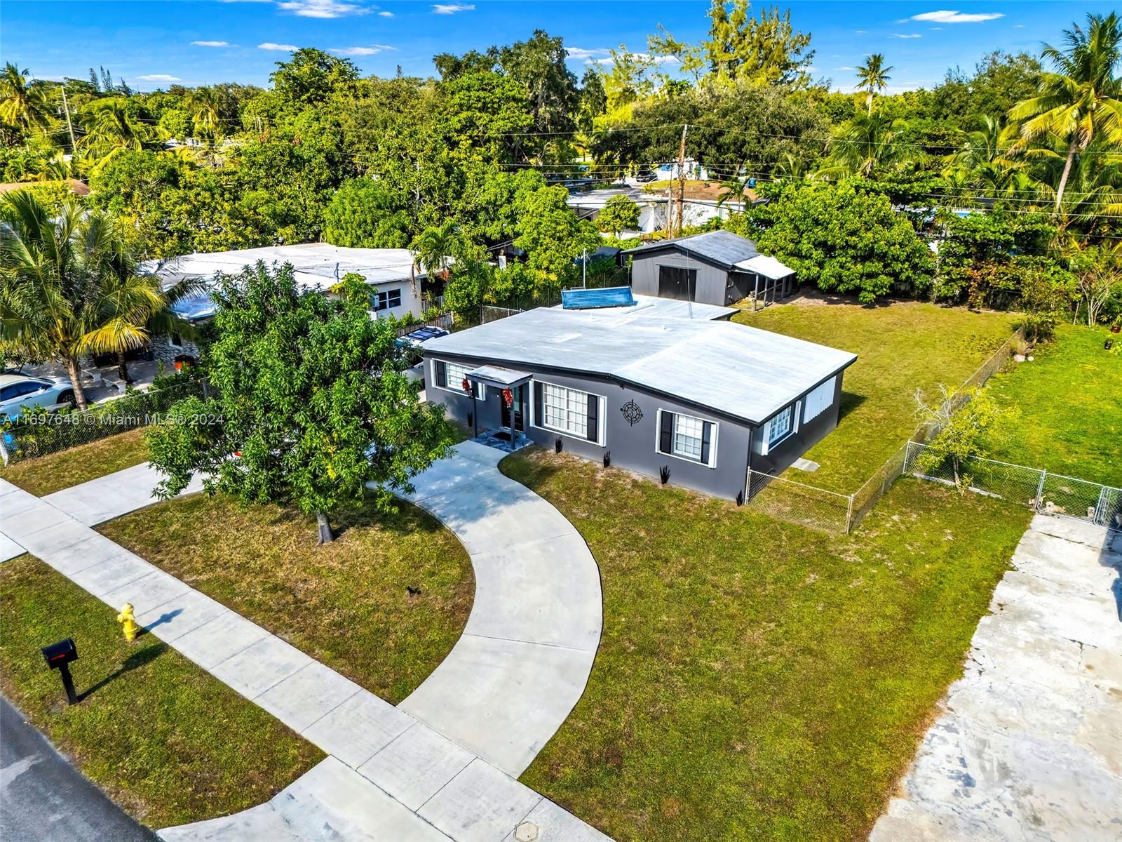 a view of a house with a swimming pool