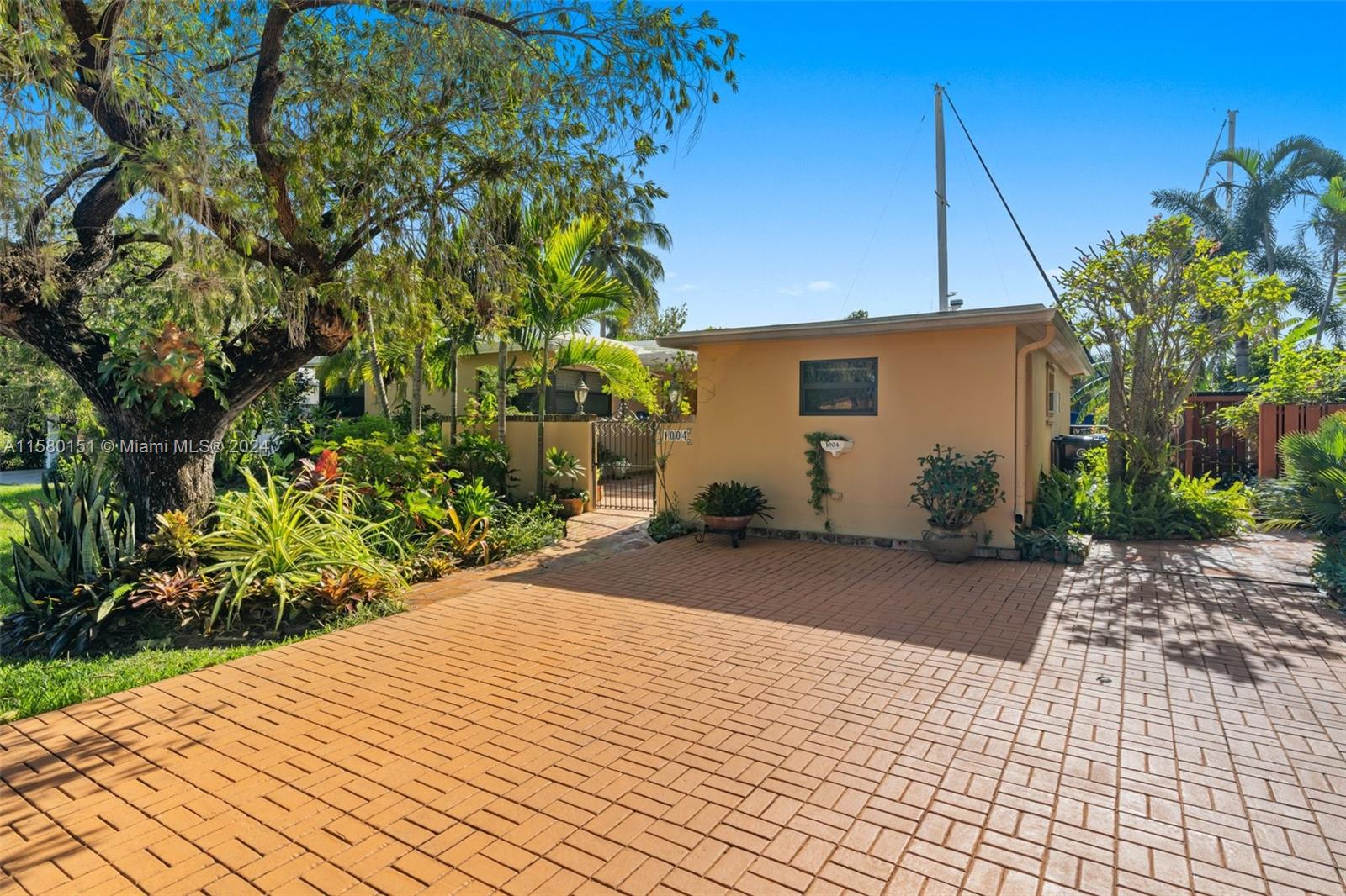 a view of backyard and entertaining space