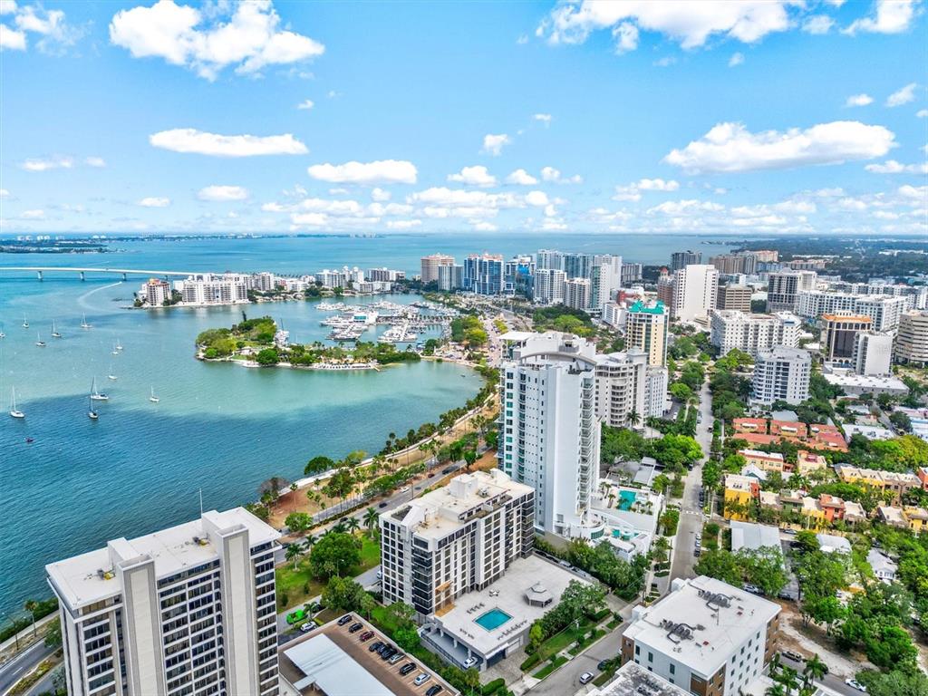 a view of a city with an ocean view