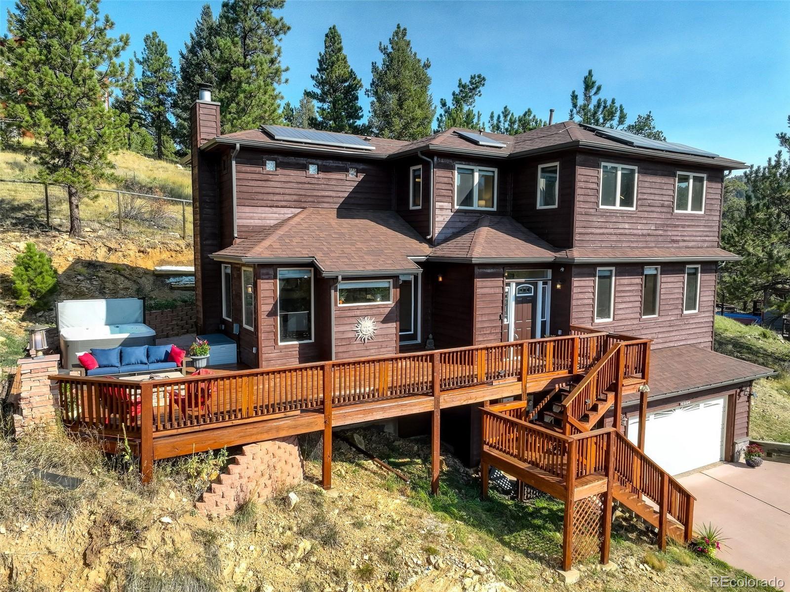 a front view of a house with roof deck