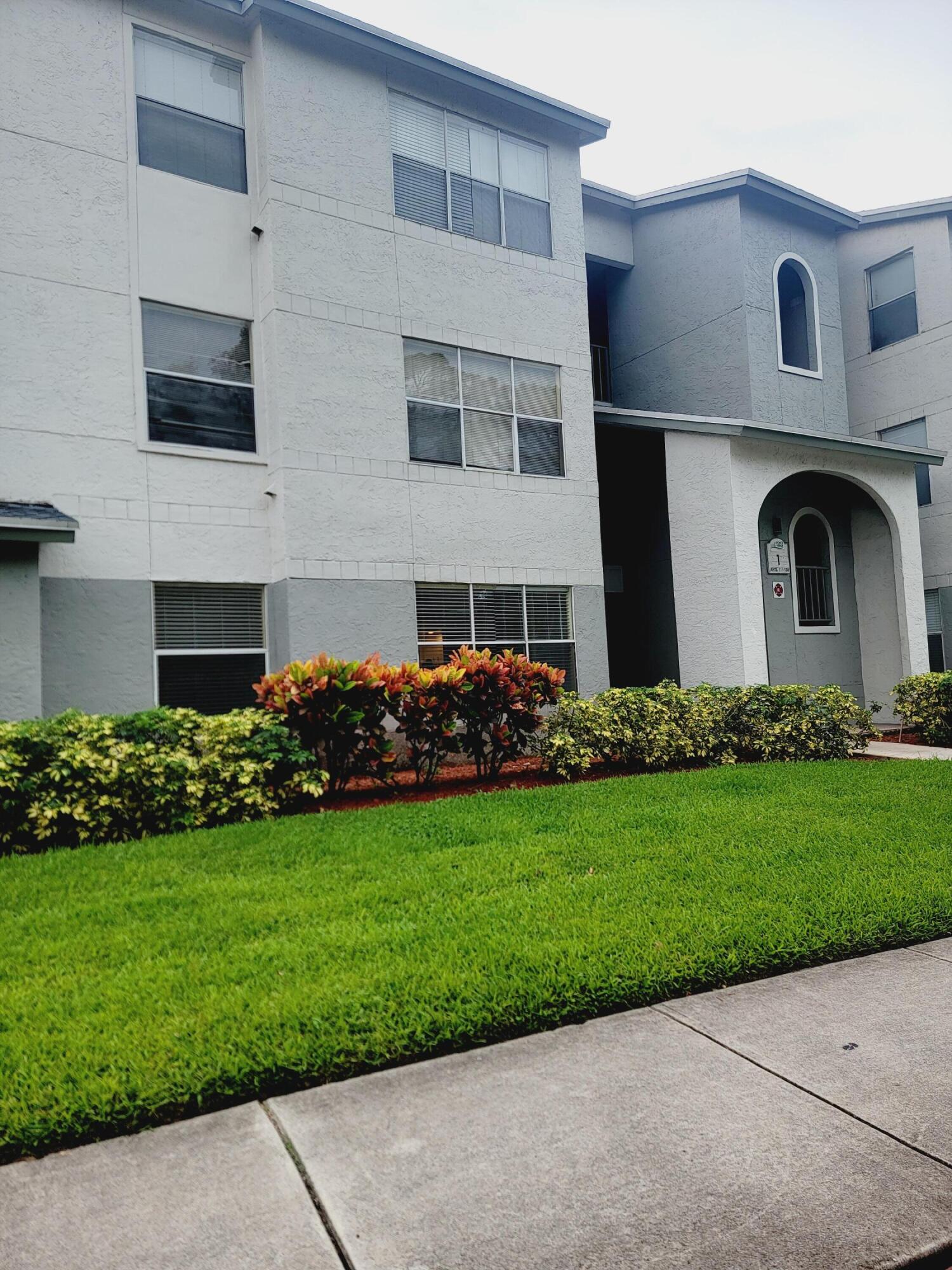 a front view of house with yard