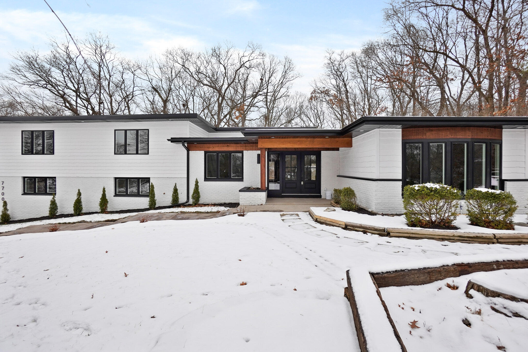 a house view with a outdoor space