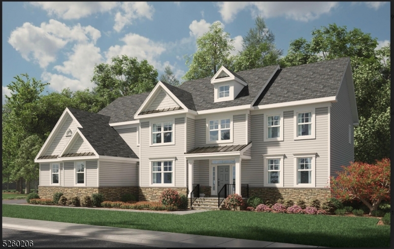 a front view of a house with a yard and trees