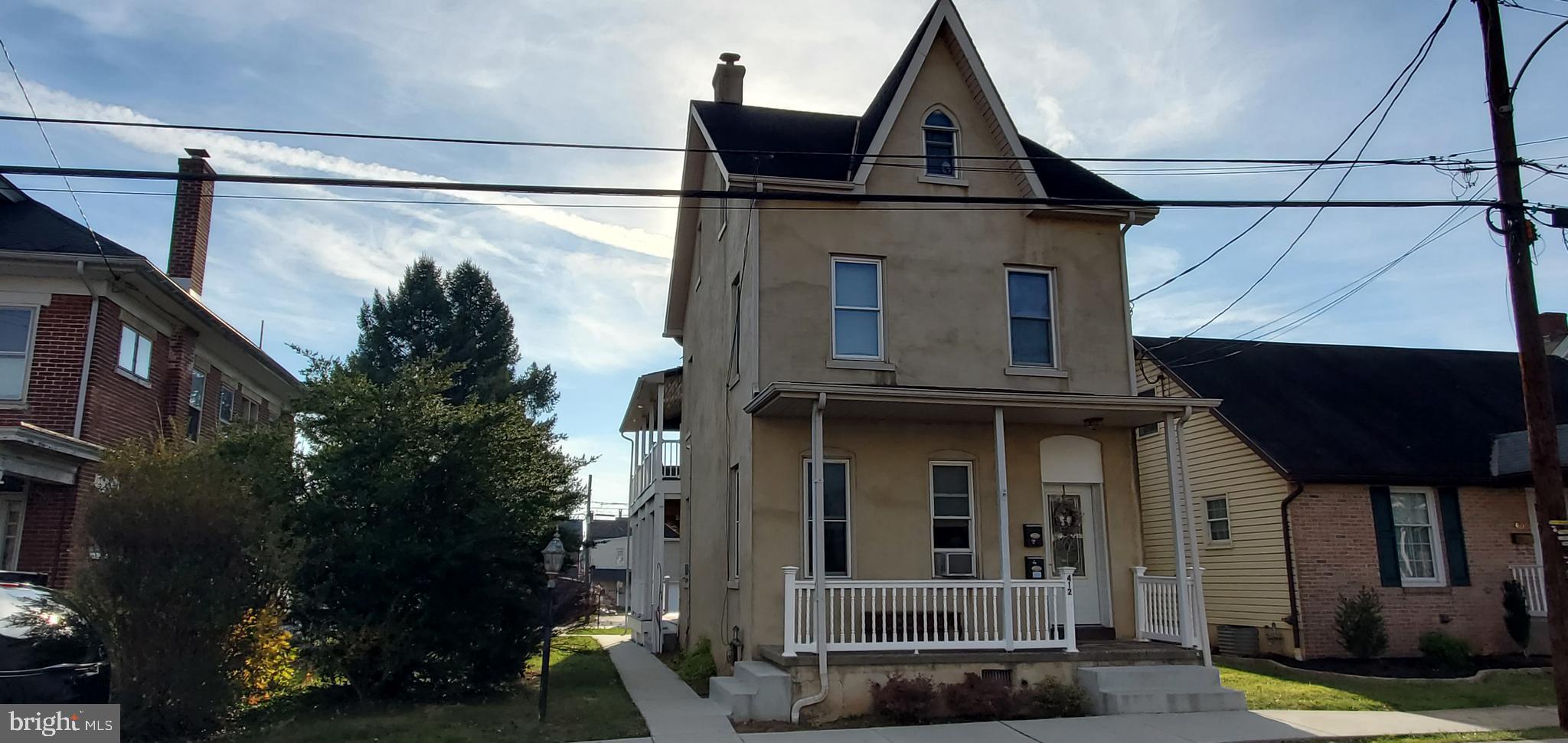 a view of a house with a porch