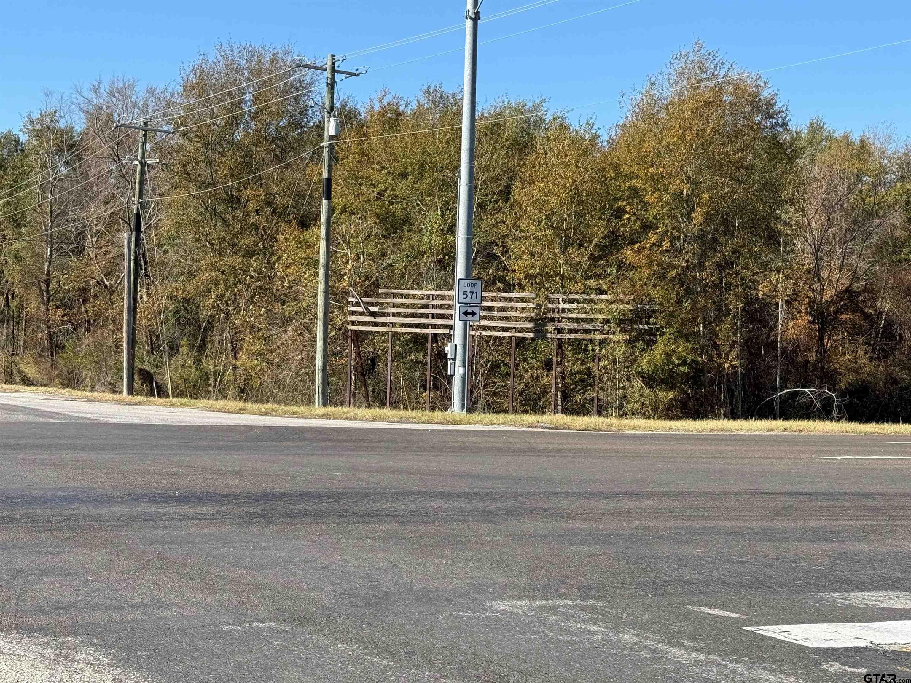 a view of a house with a road