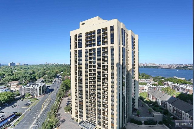 a view of a balcony with city view