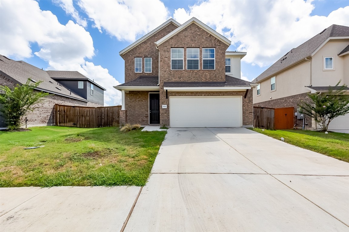 a front view of house with yard