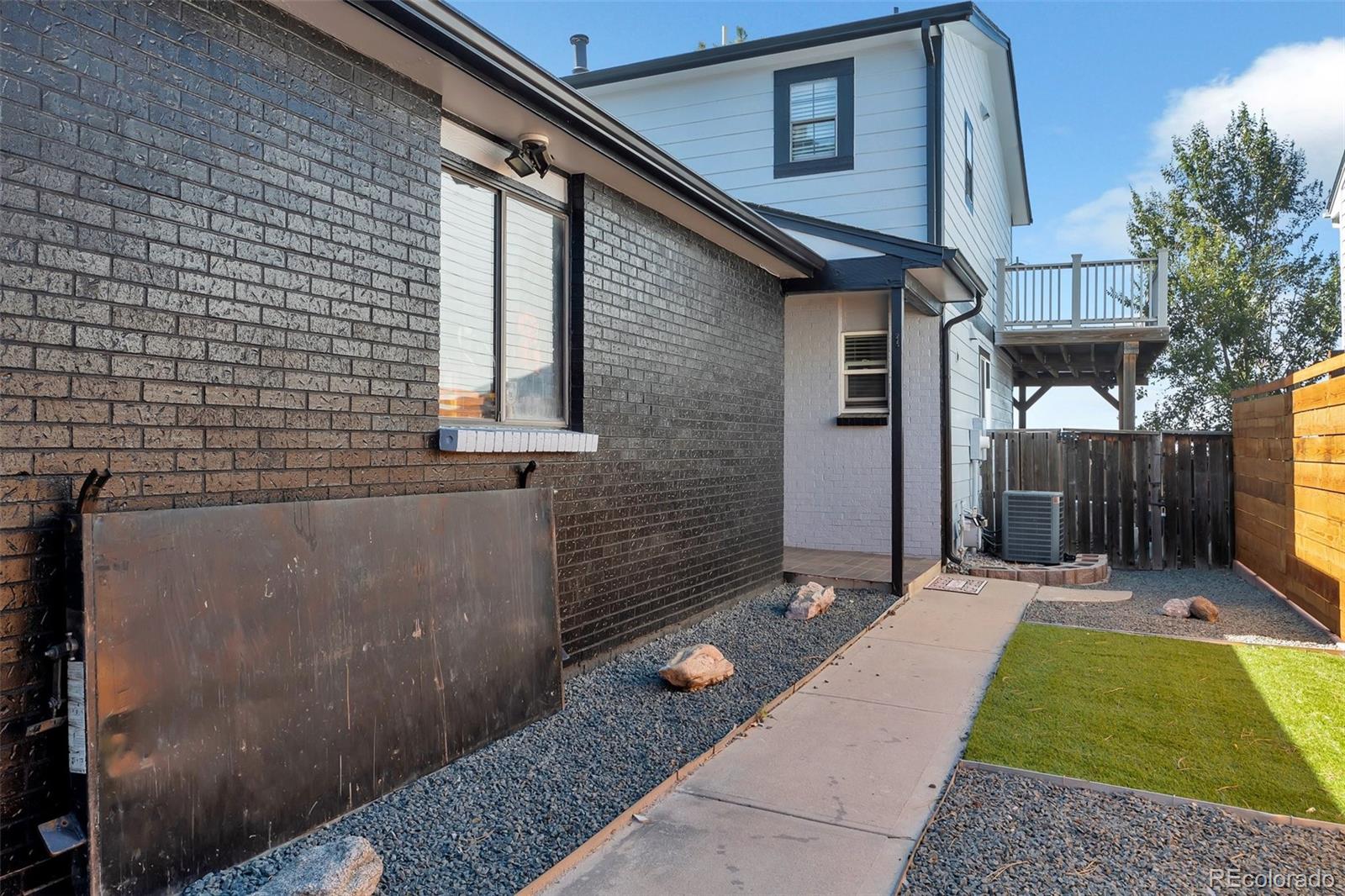 a backyard of a house with seating space