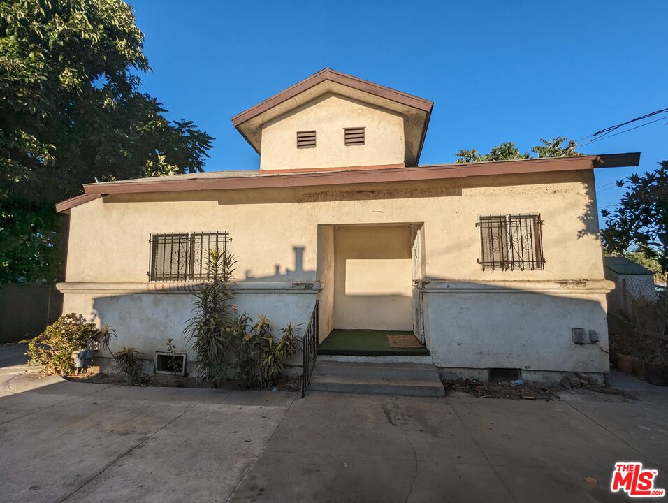 a front view of a house with a garage