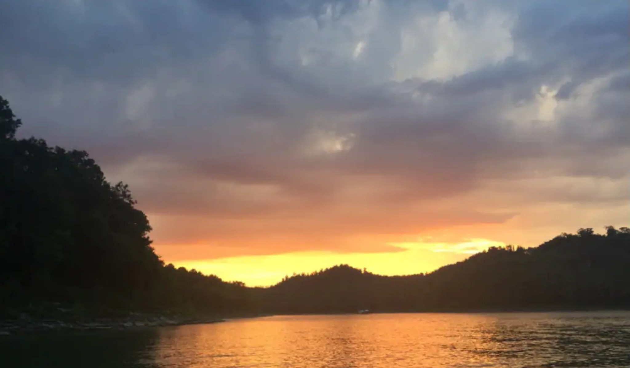 a view of lake with mountain