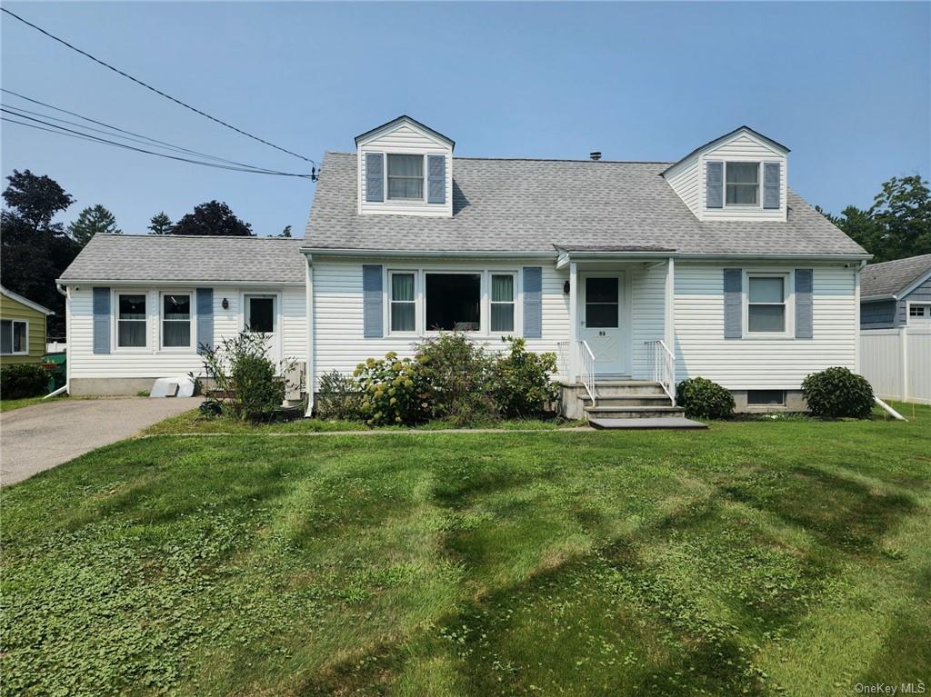 Cape Cod home that almost lives like a ranch but has a huge bonus room upstairs if needed