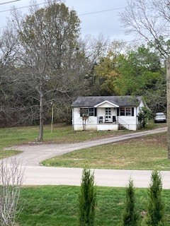 a view of a house with a big yard