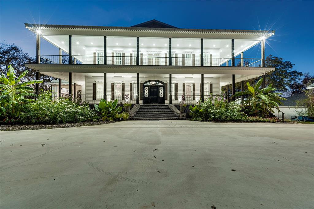 front view of a house with a garden