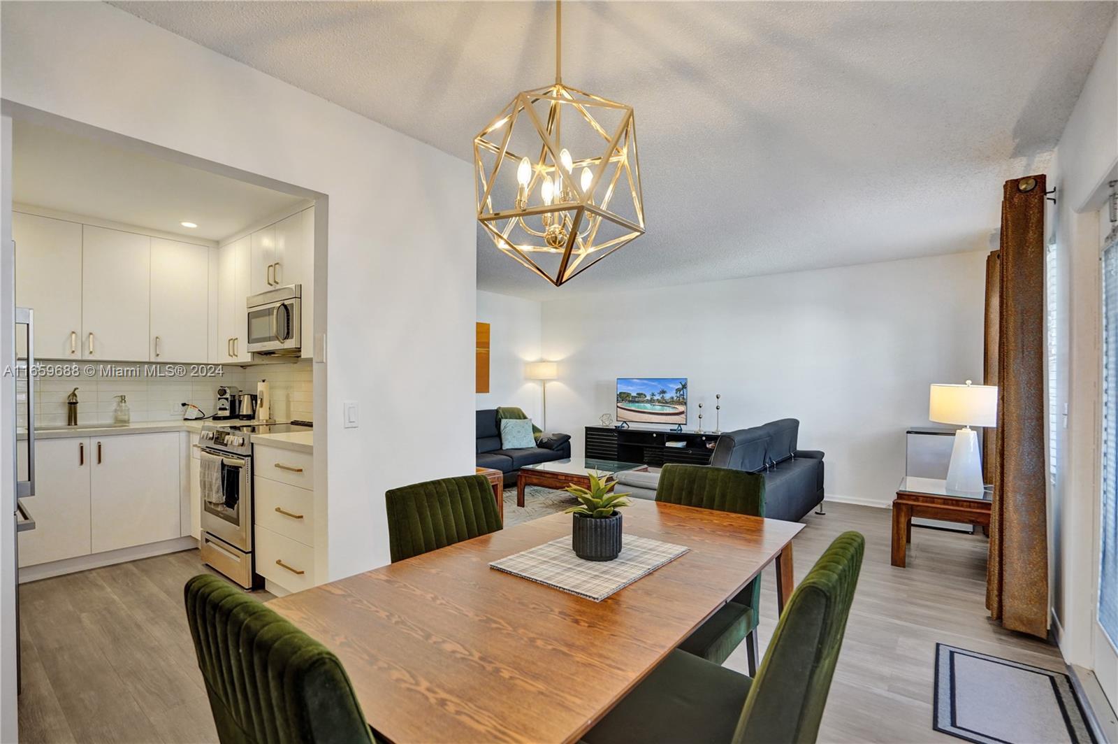 a view of a dining room with furniture