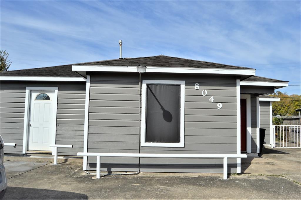 a front view of a house with a garage