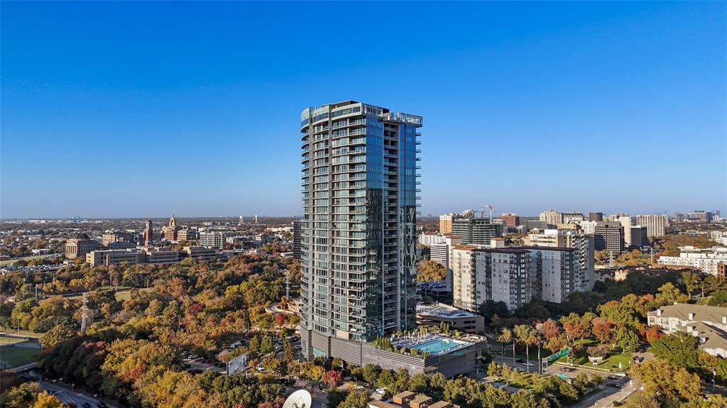 a view of a city with tall buildings in the background