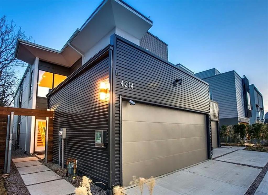 a front view of a house with garage