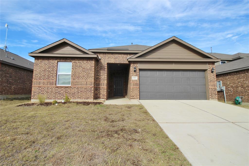 a front view of a house with yard