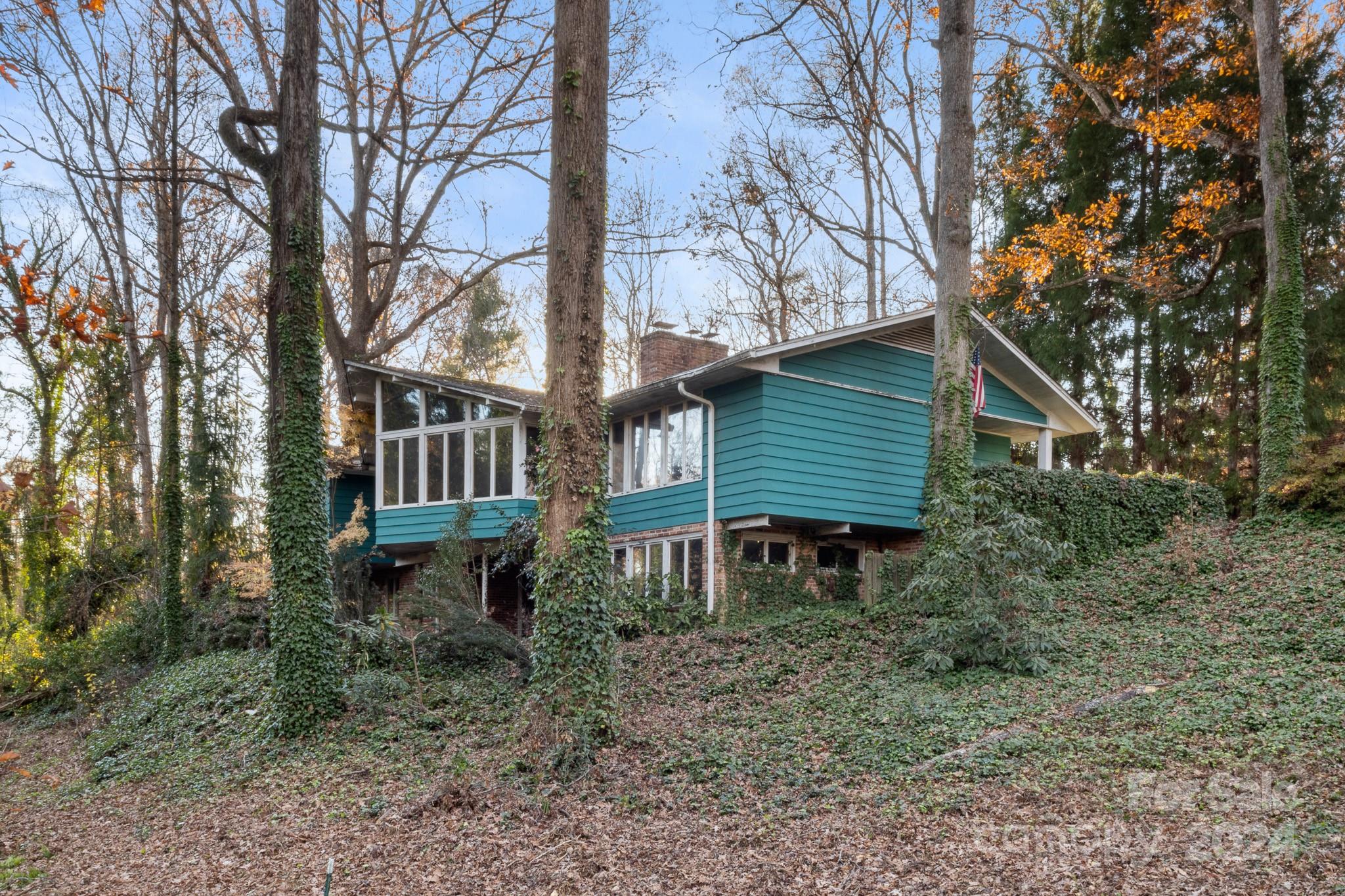 a house view with a backyard space