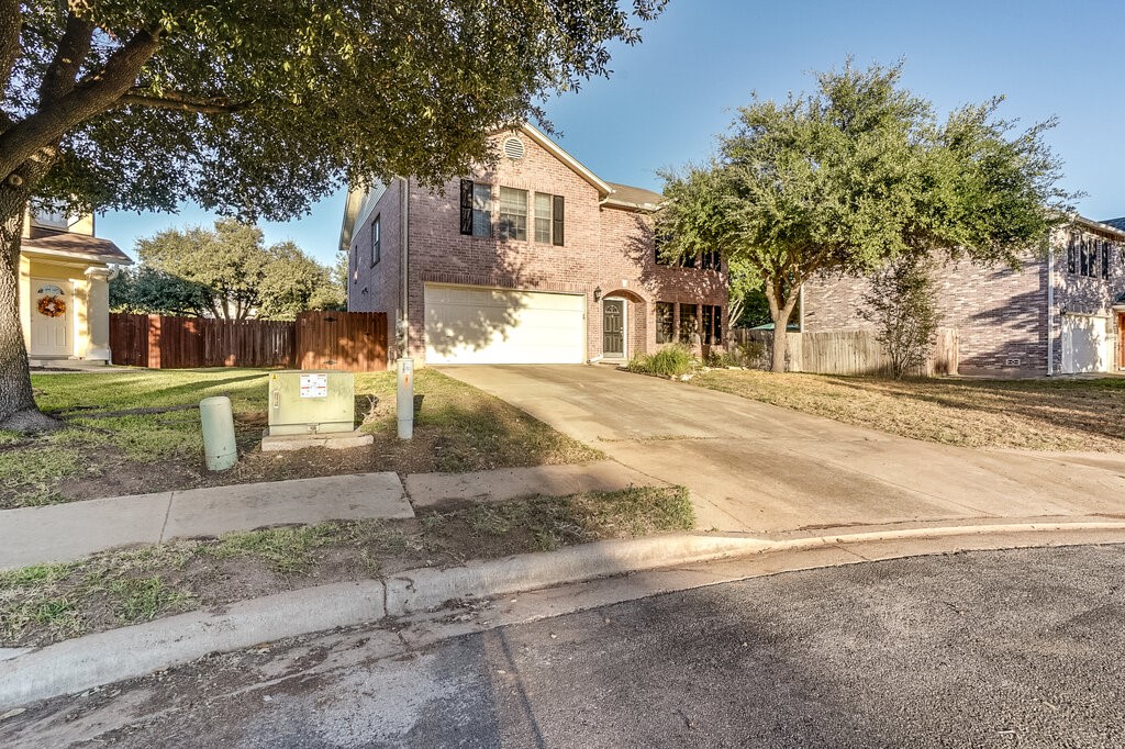 front view of a house with a street