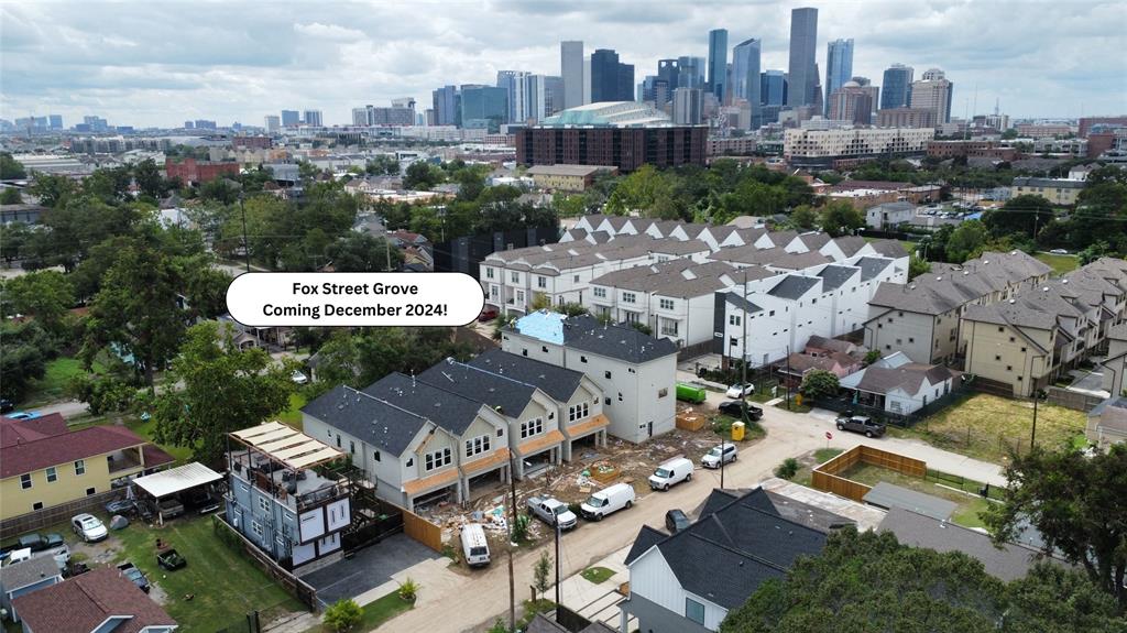 an aerial view of a city with lots of residential buildings