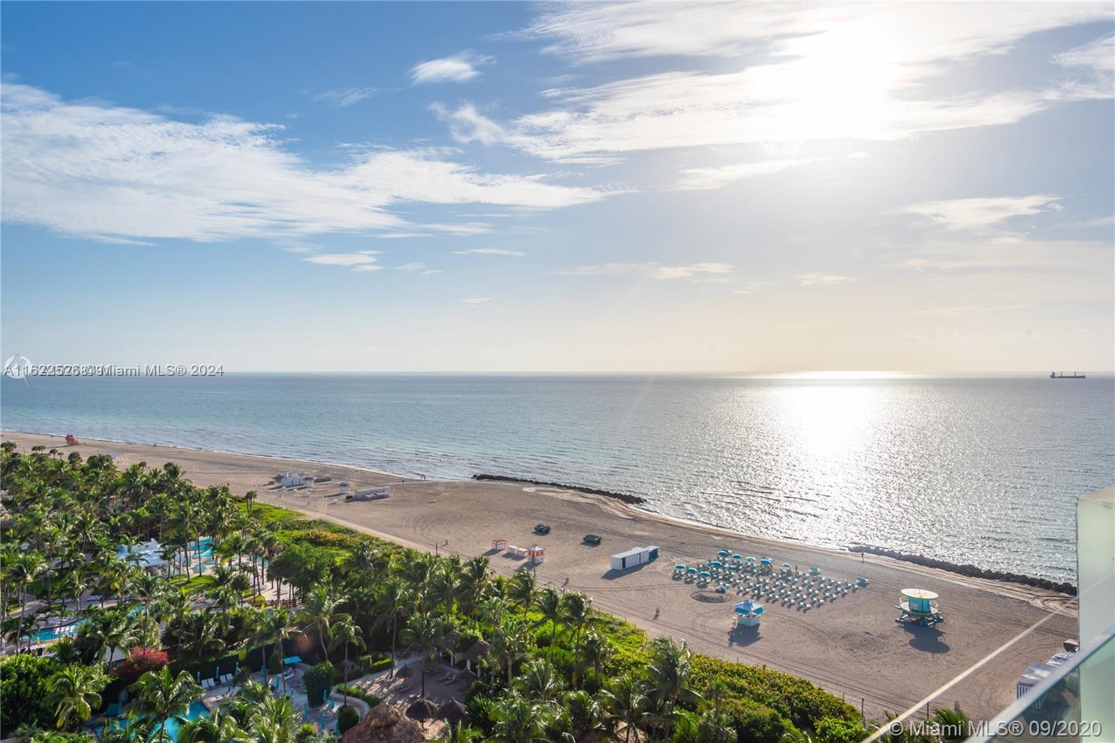 an aerial view of beach and ocean