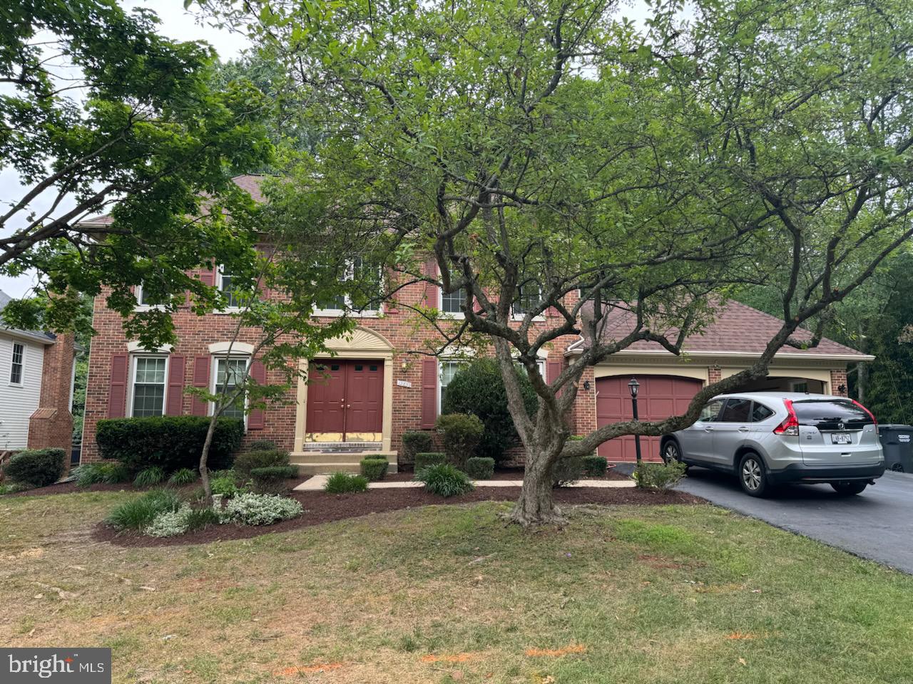 a view of a car parked in front of house