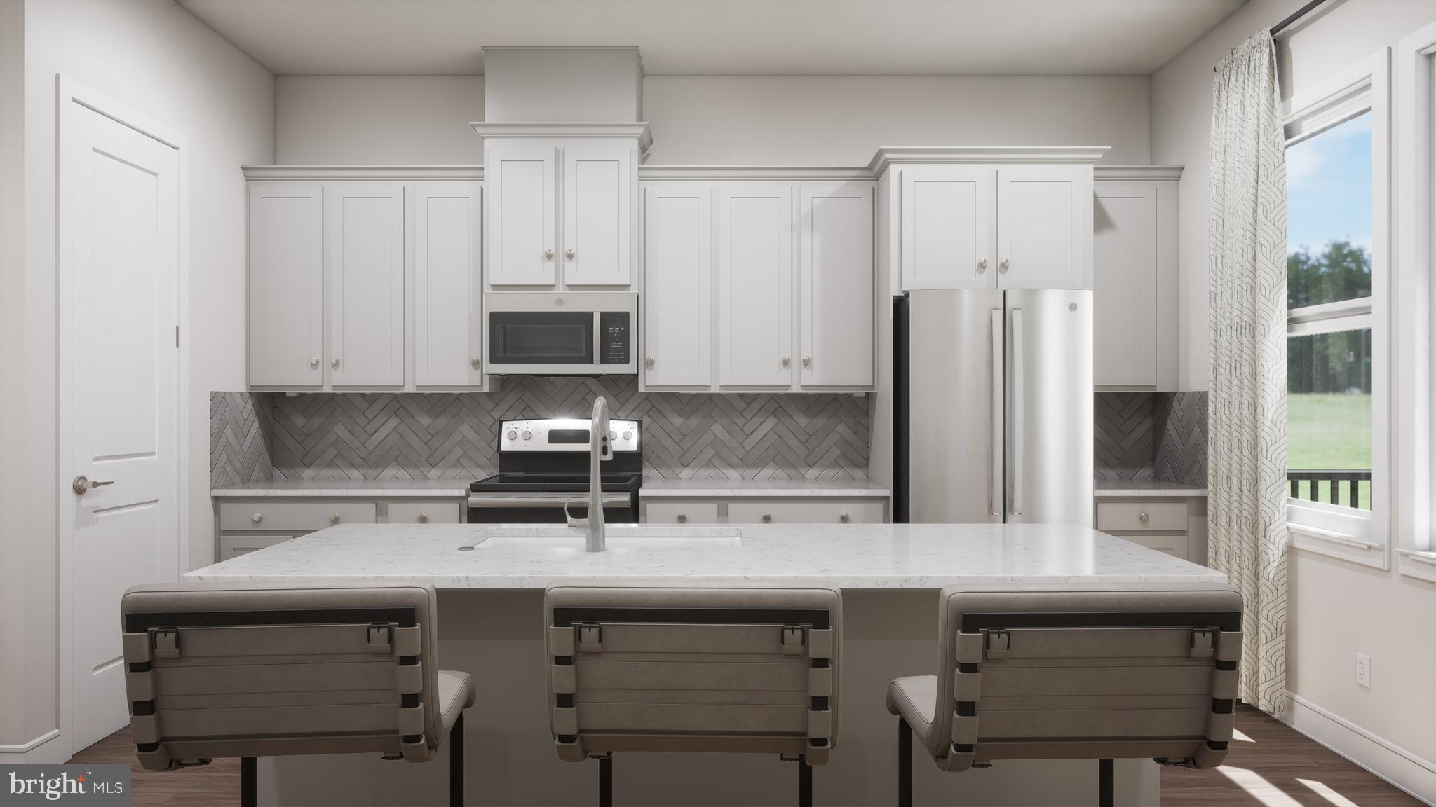 a kitchen with a sink cabinets and appliances