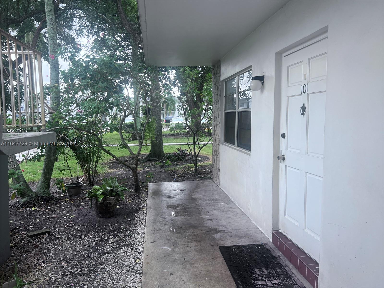 a view of a door and trees in the house