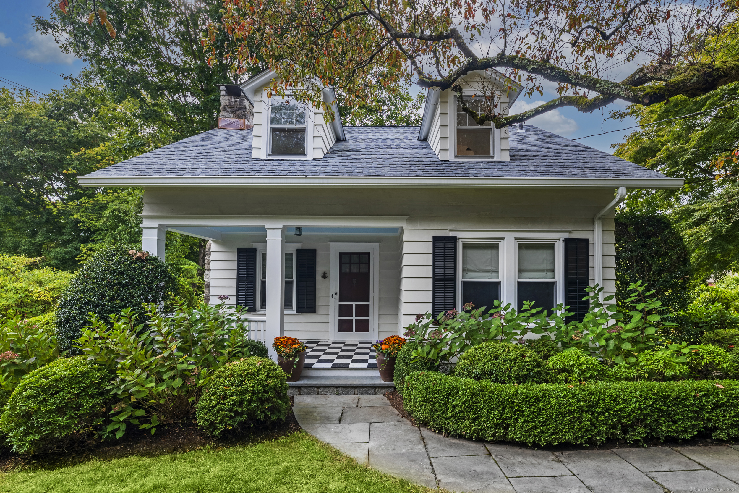 a view of a house with a garden