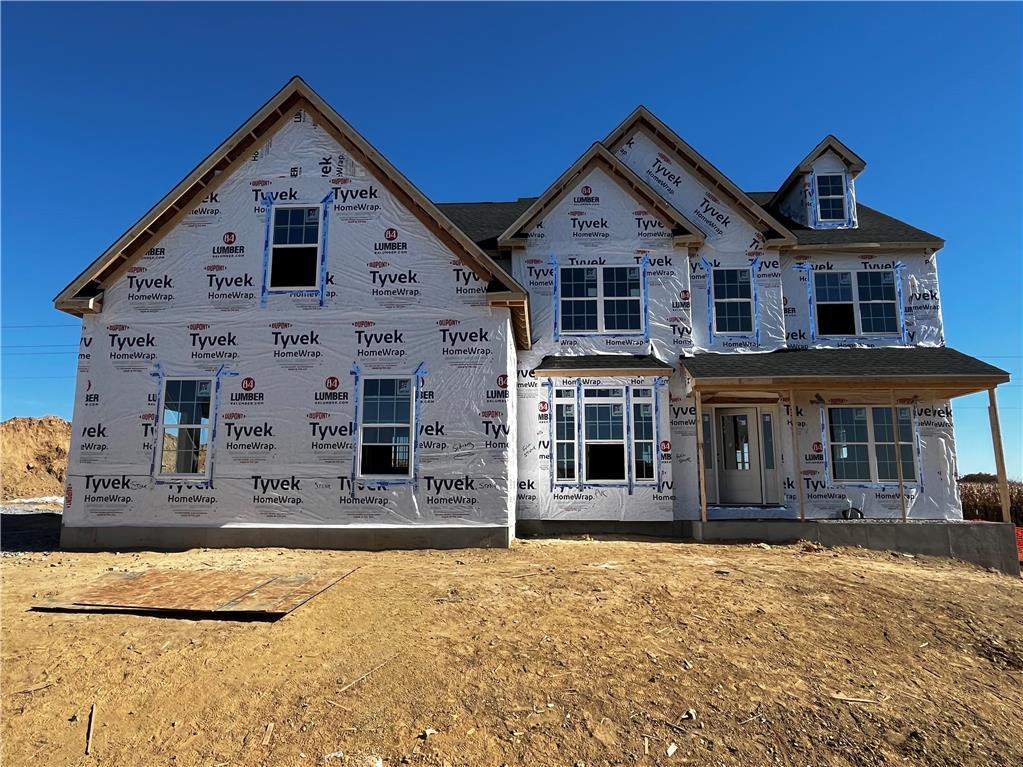 a front of a house with a yard