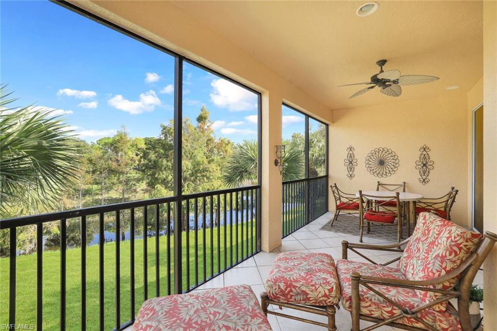 a balcony with furniture and a view