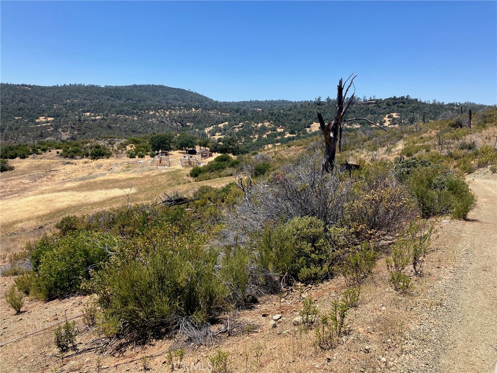 a view of mountain view with mountains in the background