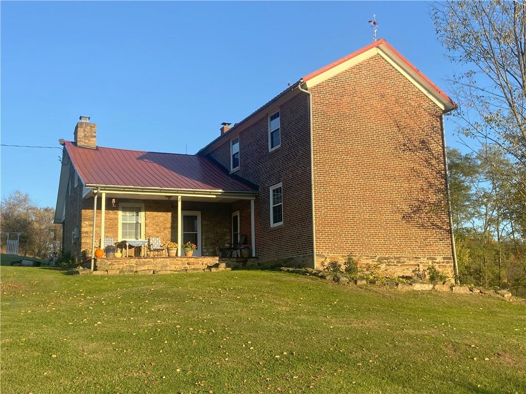 a front view of house with yard