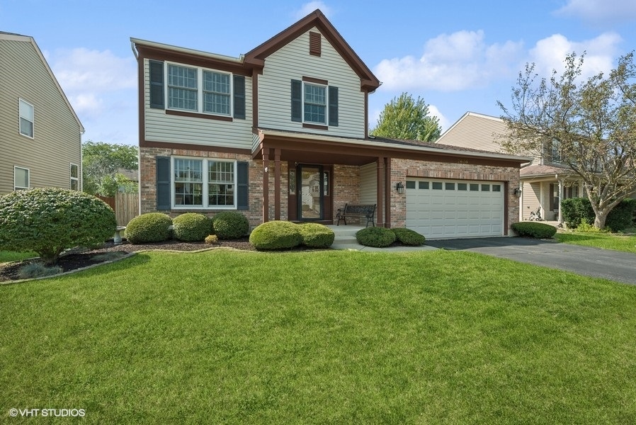 a house view with a garden space