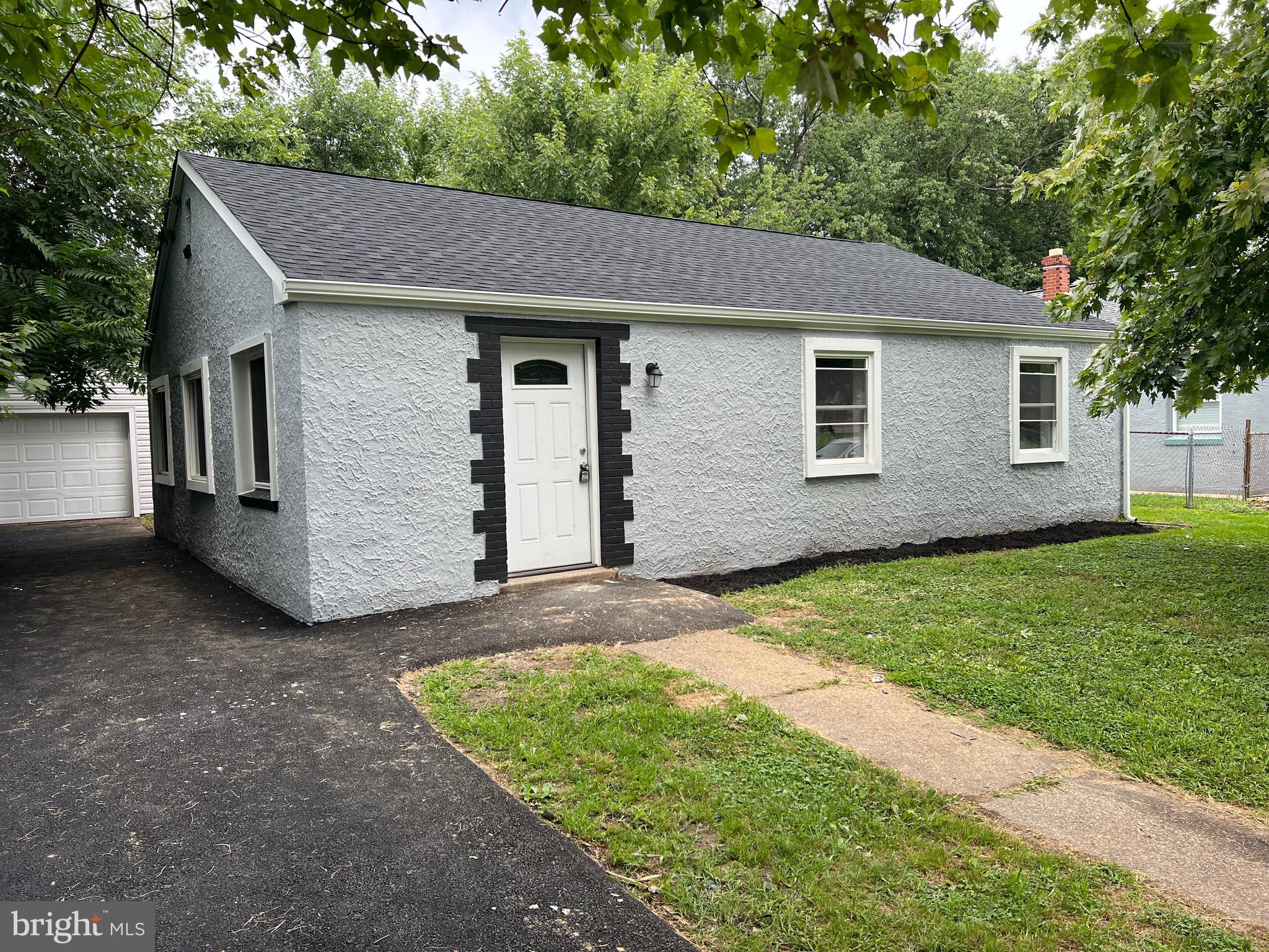 a aerial view of a house with a yard