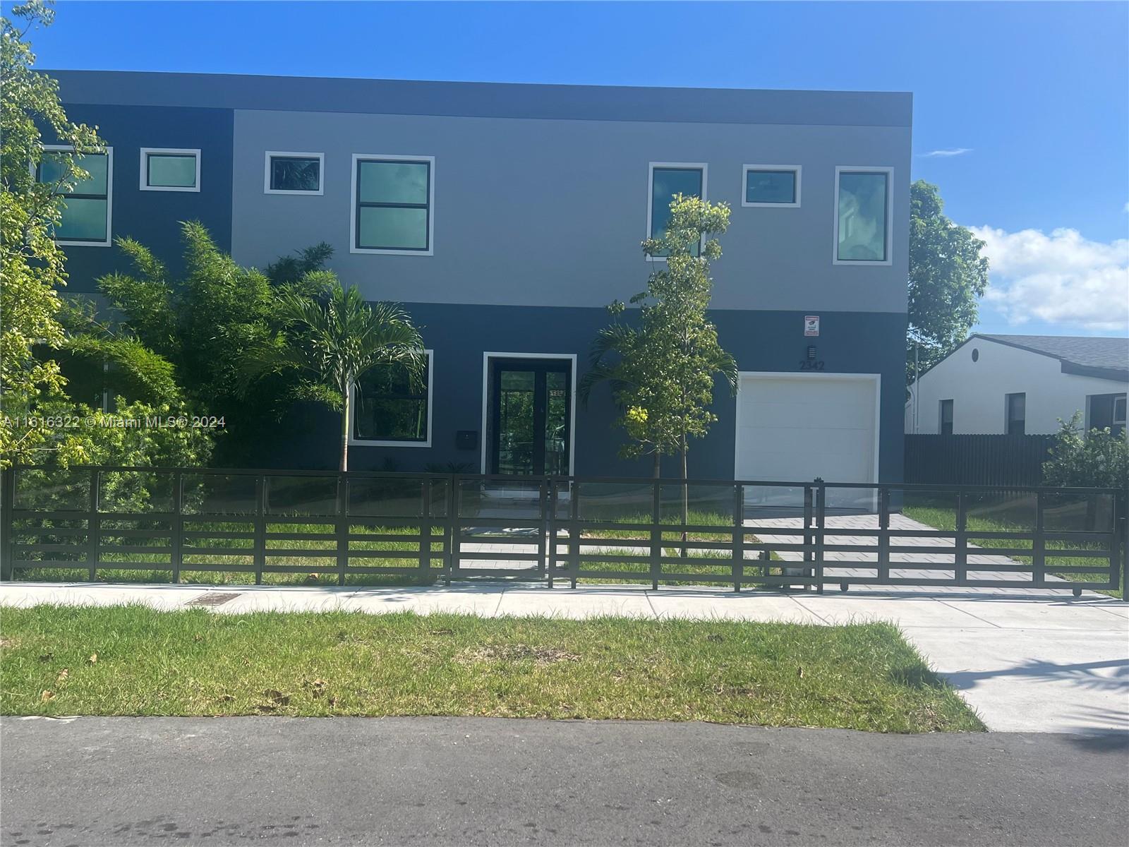 a front view of house with yard