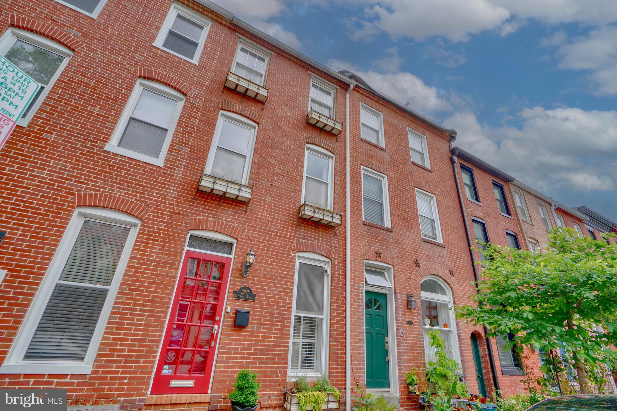 a front view of a multi story residential apartment building