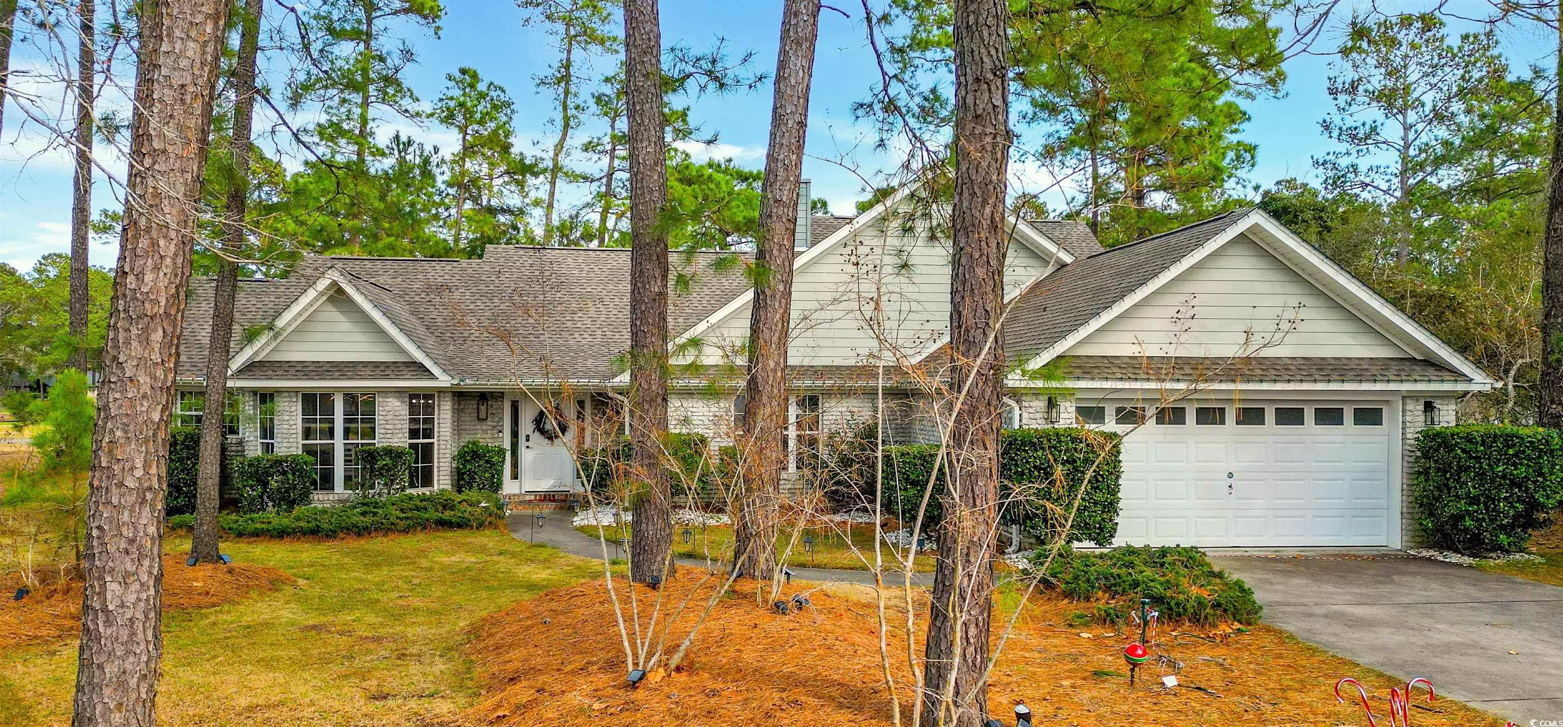 View of front of house with a front lawn