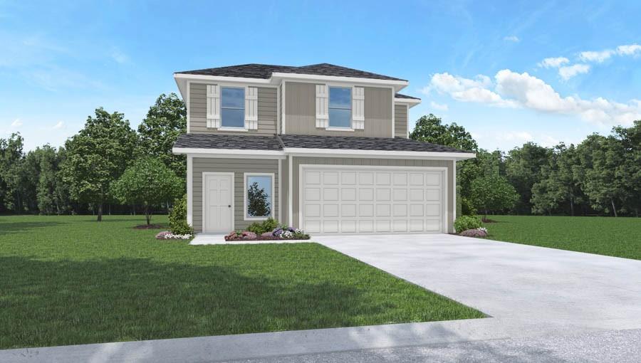 a front view of a house with a yard and garage