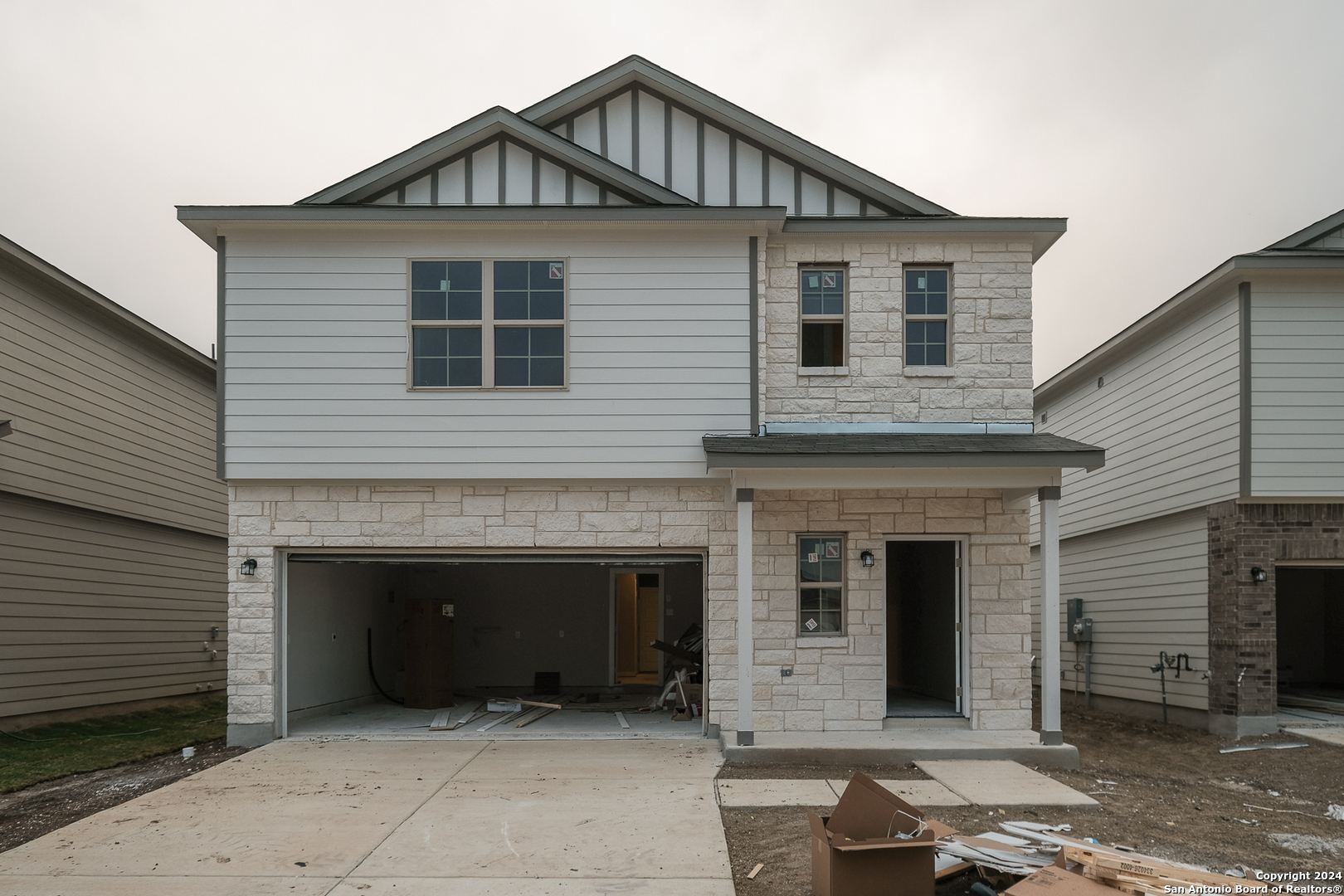 a front view of a house with yard