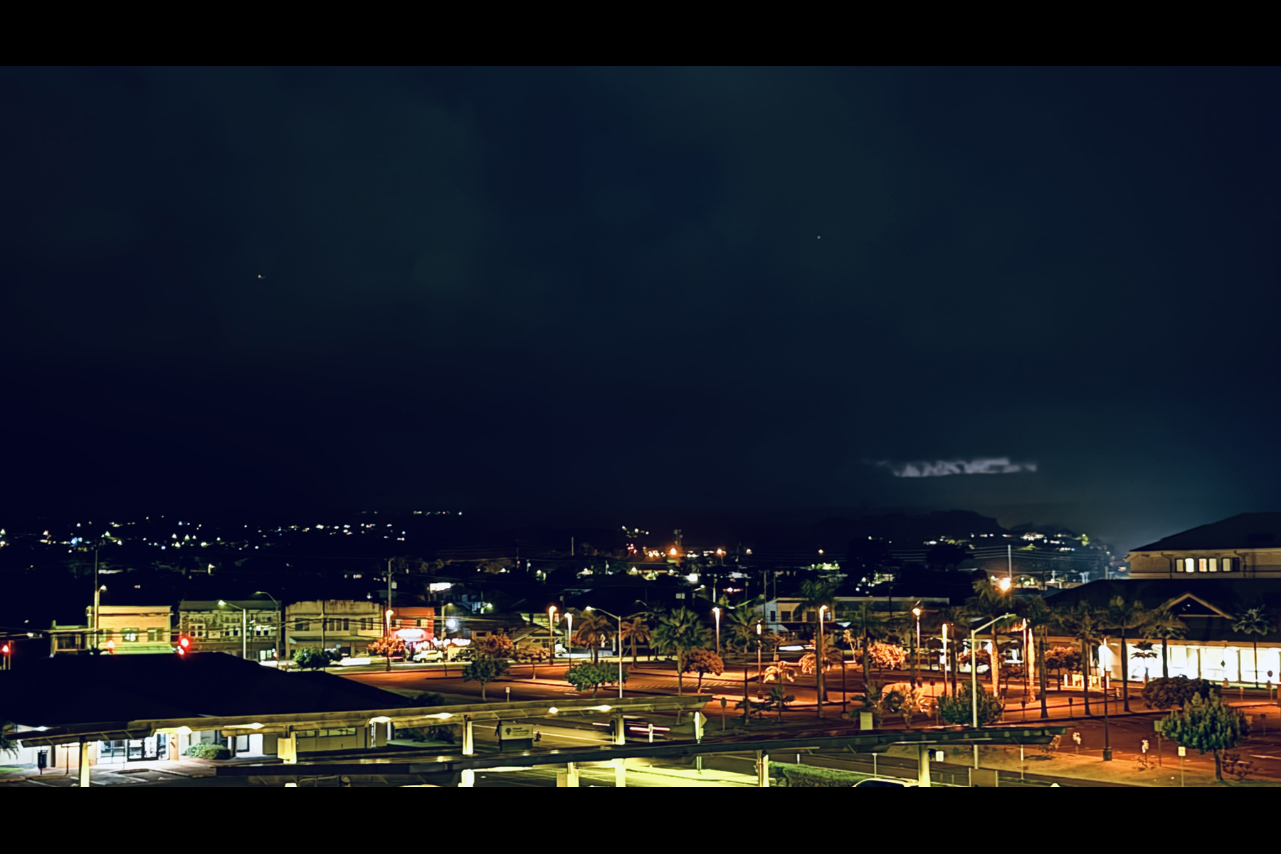 Night view from living room balcony of unit 421 at the Hilo Lagoon Centre.