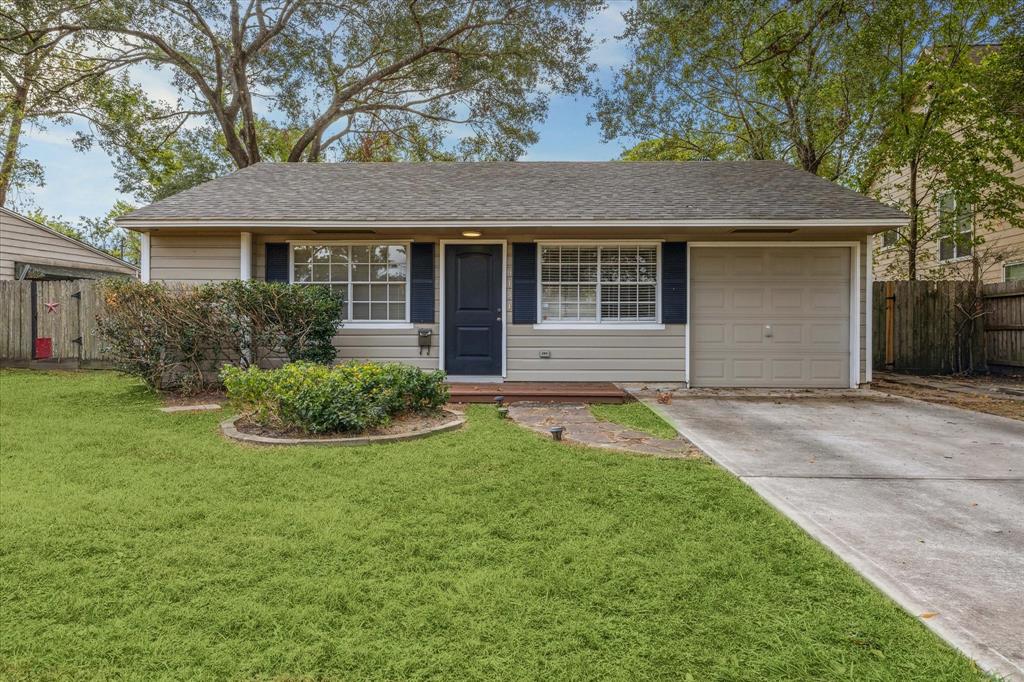 front view of a house and a yard