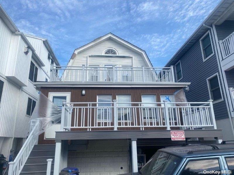 a view of a house with a deck