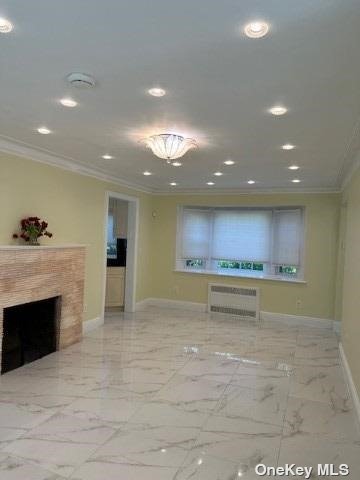 a view of kitchen and a fireplace